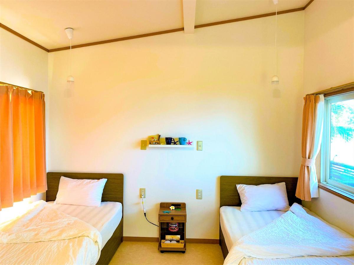 Le Grand Bleu Hotel Amami Bagian luar foto