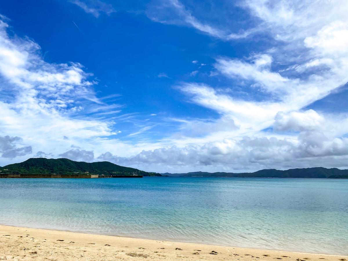 Le Grand Bleu Hotel Amami Bagian luar foto